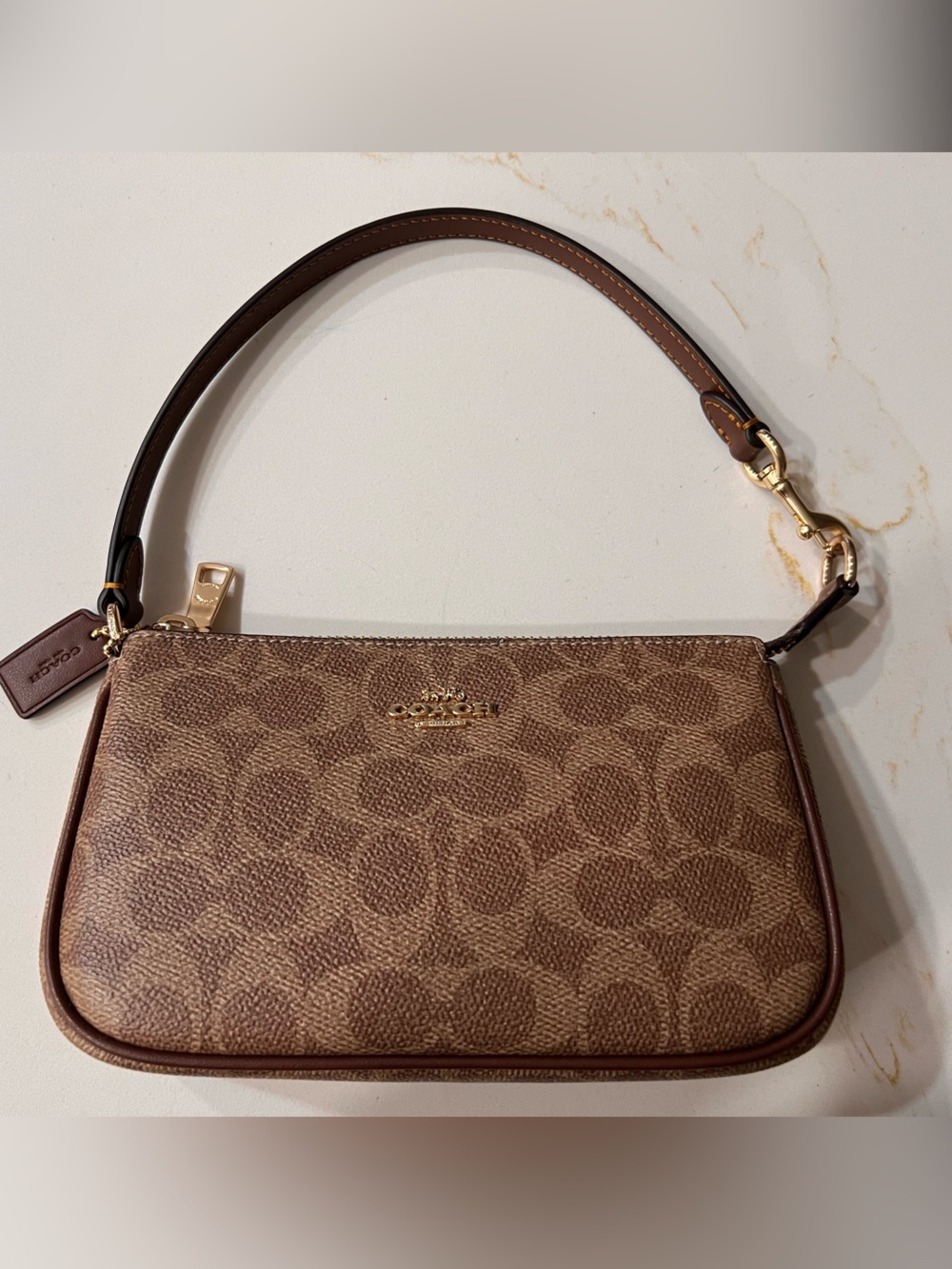 Coach Nolita 19